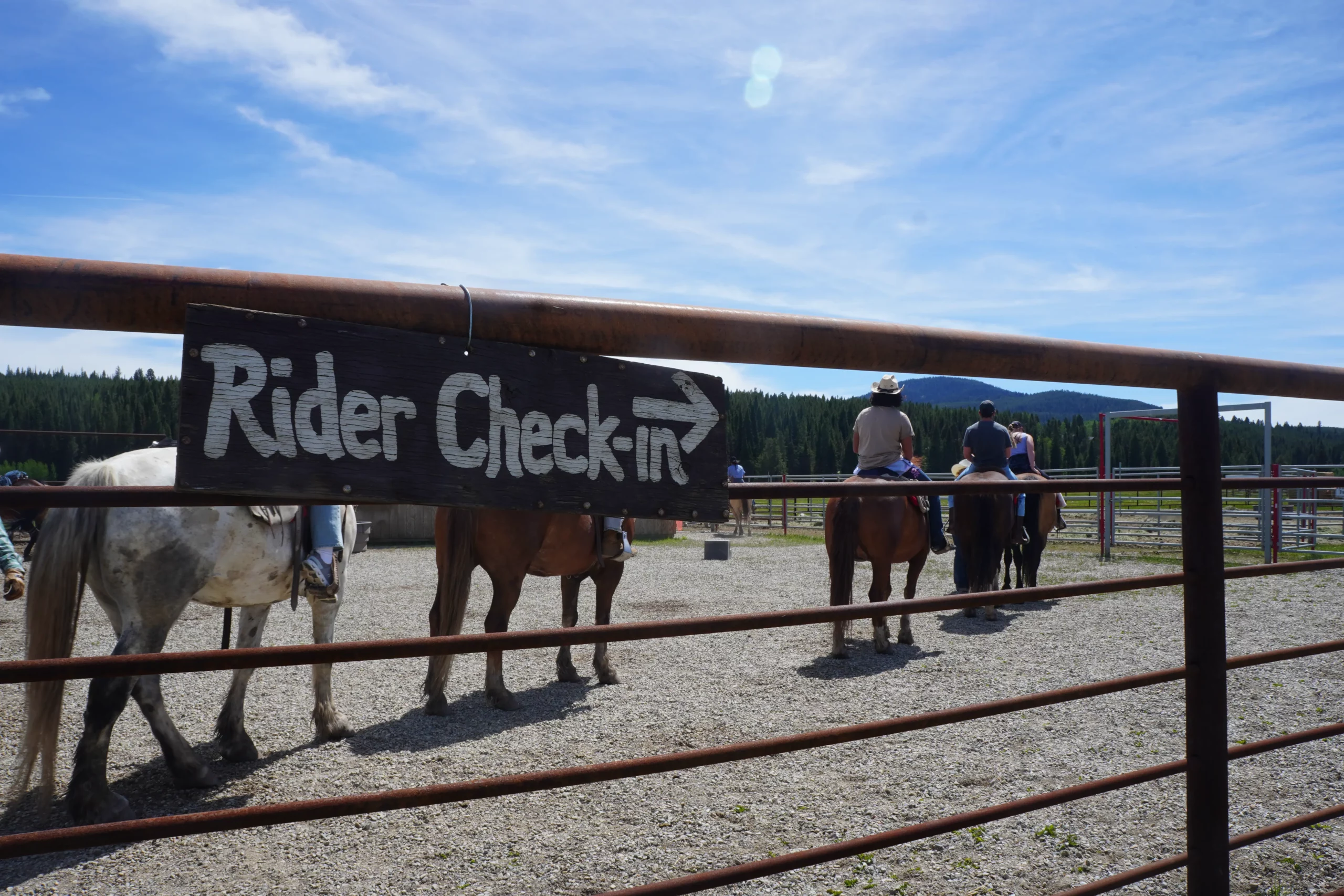 picture of rider checkin and corral at Diamond P Ranch to show horseback ride near yellowstone